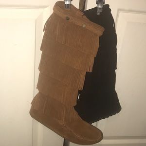 Two pair of Tall Minnetonka 5 layer fringe boots